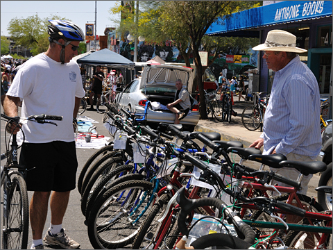 Bicycle photography - shopper and seller at spring 2011 Bike Swap Meet, Tucson, Arizona