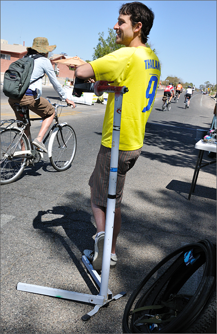 Bicycle photography - Bike mechanic and shop owner Steve Vihel offers bike repairs at Cyclovia Tucson