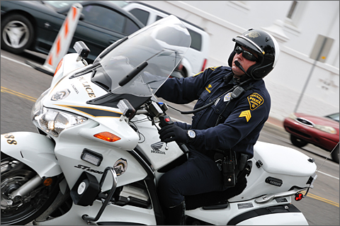 Event photography - Police bike patrol officer at 22nd Street and 6th Avenue in Tucson, Arizona