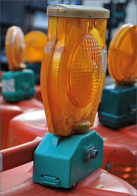 Construction photography - Safety flashers atop barrels in Ann Arbor, Michigan