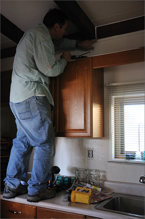 Event and construction photography: Caulking air leakages in a Tucson, Arizona residence