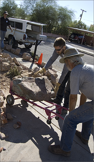 Construction photography - moving a boulder