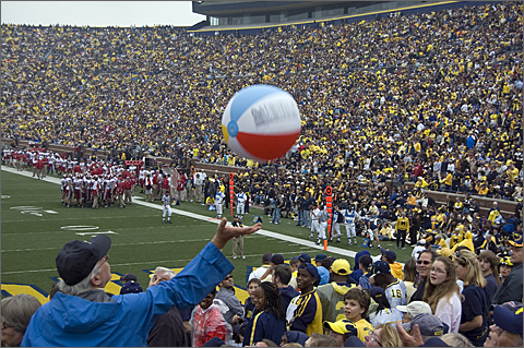 Event photography - Beach ball passing during Michigan-Indiana football game, University of Michigan, Ann Arbor