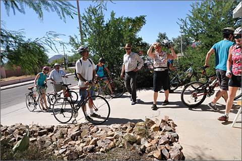 Event photography - riders arriving at my house during BICAS tour of water harvesting sites in Tucson, Arizona