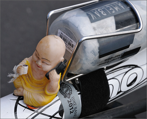 Event photography - Bicycling Buddha doll at the Fall 2012 Bicycle Swap Meet, Tucson, Arizona