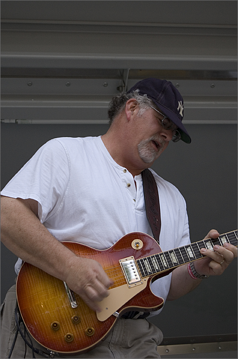 Event photography - Bluesman Clark Engelbert of CrossCut Saw at the 2009 Tucson Firefighters Chili Cookoff