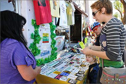 Event photography - Gloo Factory sticker sales table at the 4th Avenue 2010 Winter Street Fair, Tucson, Arizona