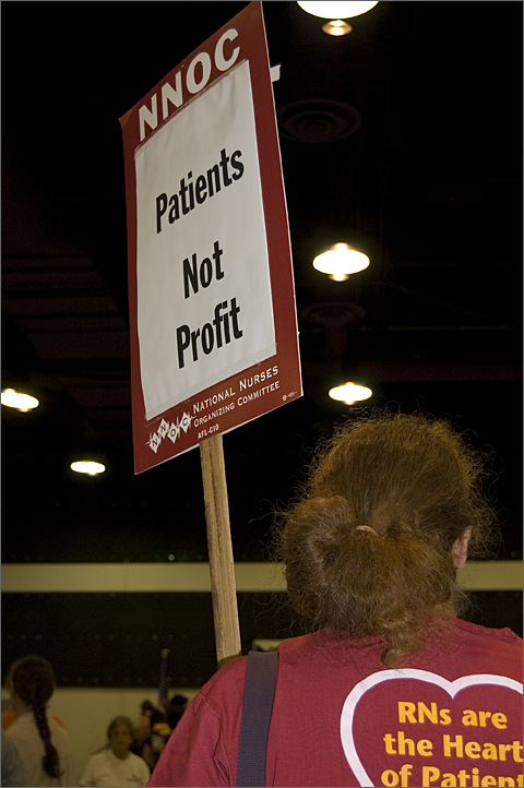 Event photography - Displaying sign at health care reform rally, Tucson, Arizona