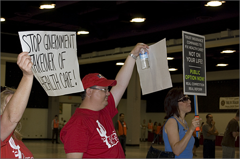 Event photography - Dissenters with signs at health care reform rally, Tucson, Arizona