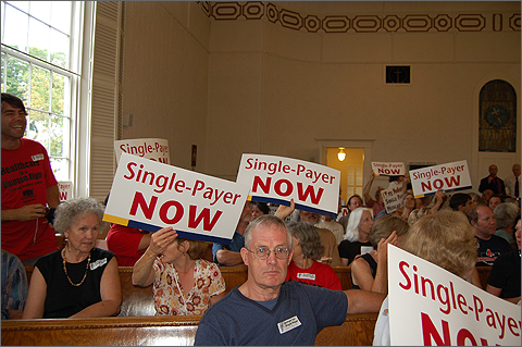 Event photography - signs at health care reform rally in Peacham, Vermont