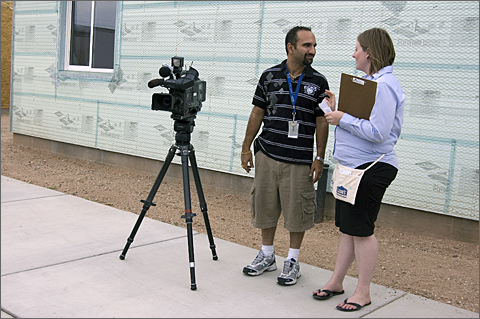 Cameraman setting up for Habitat for Humanity Tucson house dedication