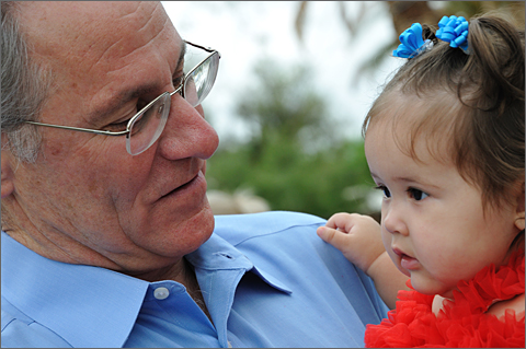 Event photography - Tucson mayor Jonathan Rothschild with baby at Palo Verde Neighborhood July 4th parade