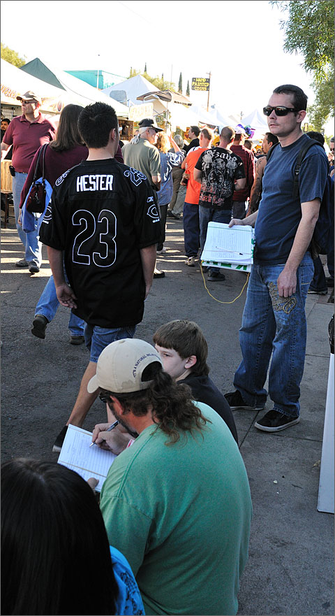 Event photography - Petition passer at the 4th Avenue 2010 Winter Street Fair, Tucson, Arizona