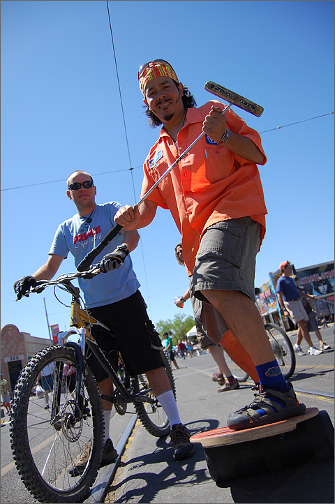 Event photography - Balancing act with polo stick at Tucson's Bicycle Swap Meet