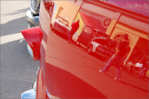 Event photography - Tucson's Fords on Fourth car show reflected on a vintage car hood