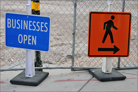 Photo essay - signs noting that 4th Avenue businesses are open during streetcar construction in Tucson, Arizona