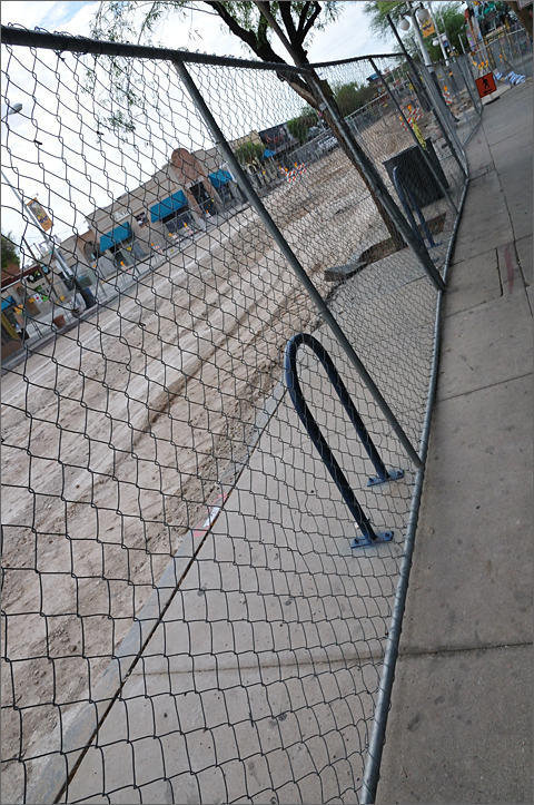 Photo essay - fenced off bicycle racks along 4th Avenue during streetcar construction in Tucson, Arizona